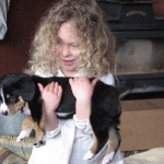 Tegwin holds puppy